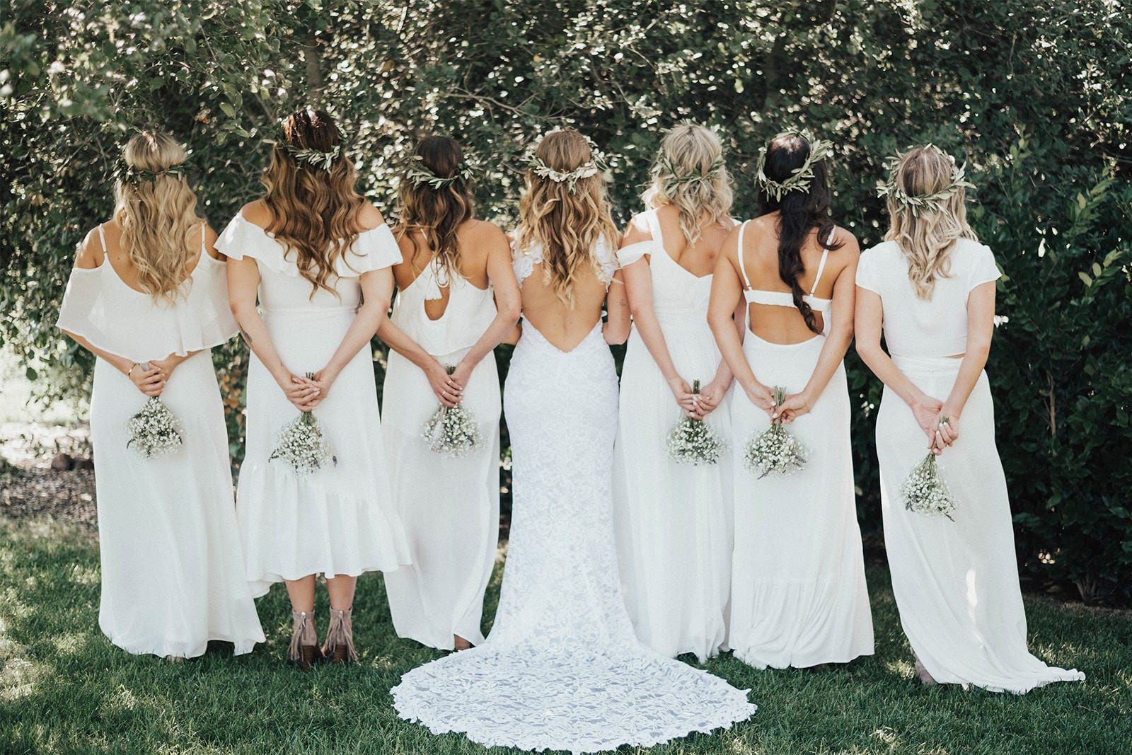 Bride wearing Grace Loves Lace Alexandra Gown standing with bridesmaids